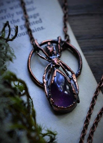 Violet gemstone amulet